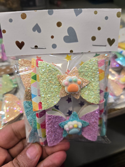 Paw print colorful bows